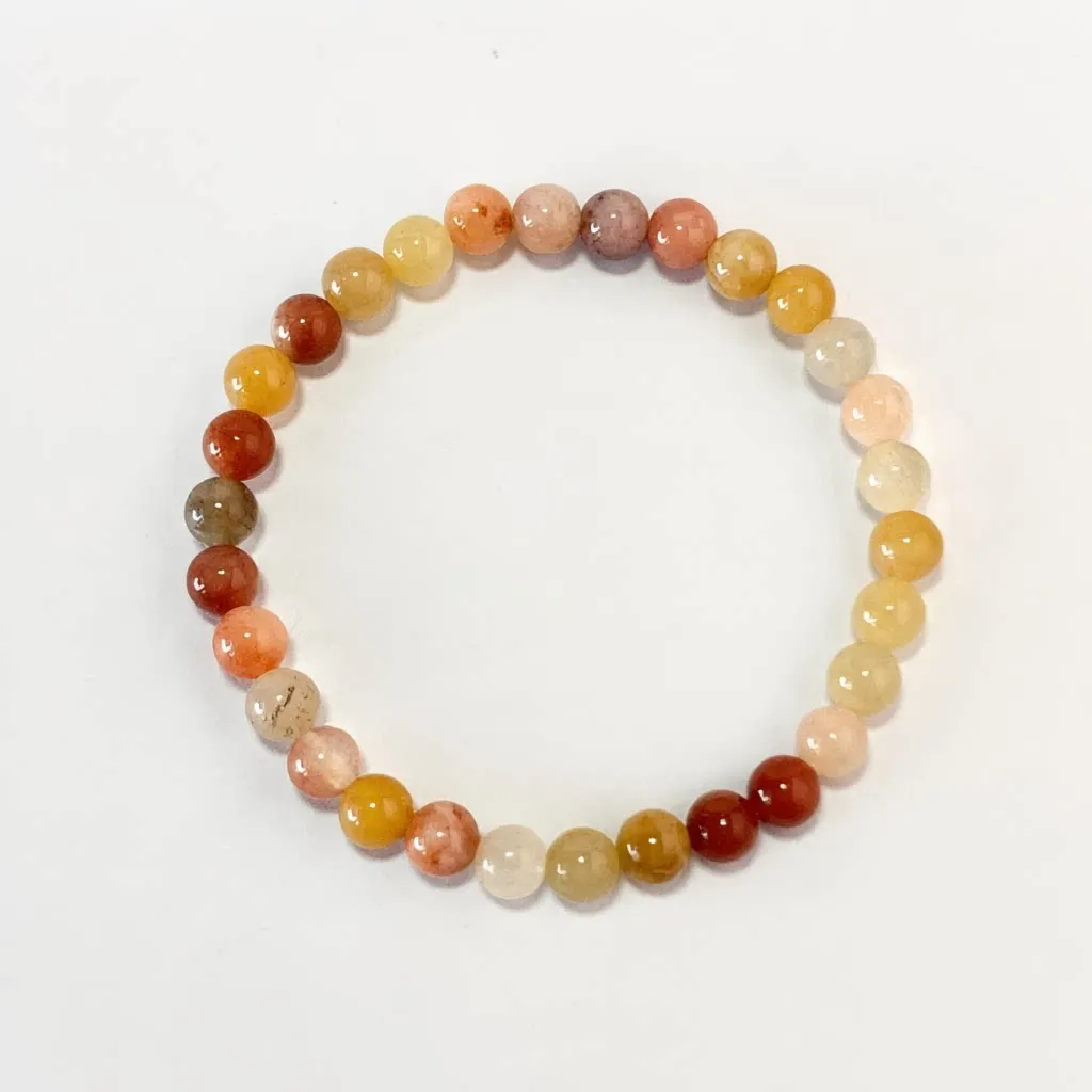 Golden Silk Jade Bracelet in 6mm natural jade beads with golden threads