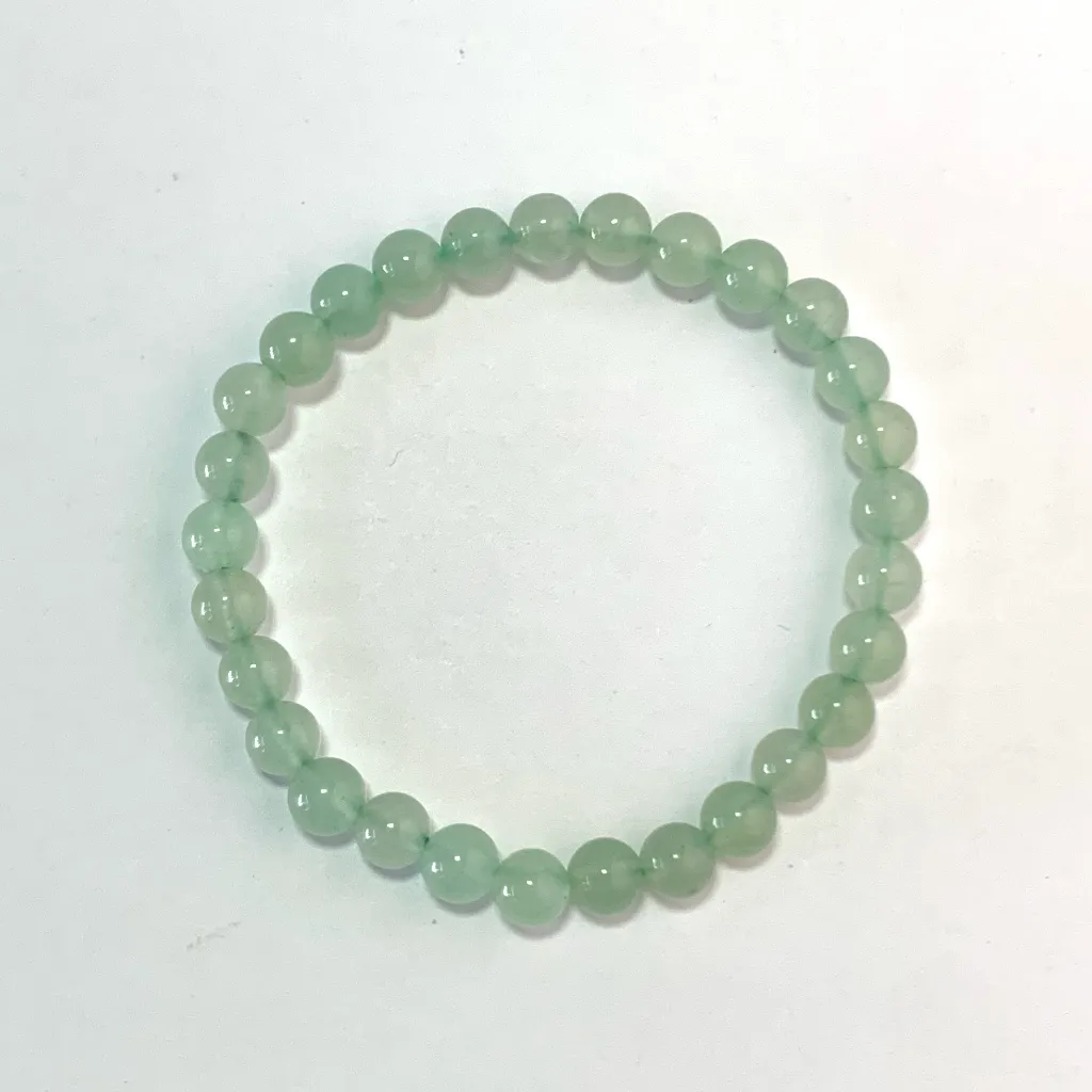Green Aventurine bracelet — front view, green aventurine beads on white background