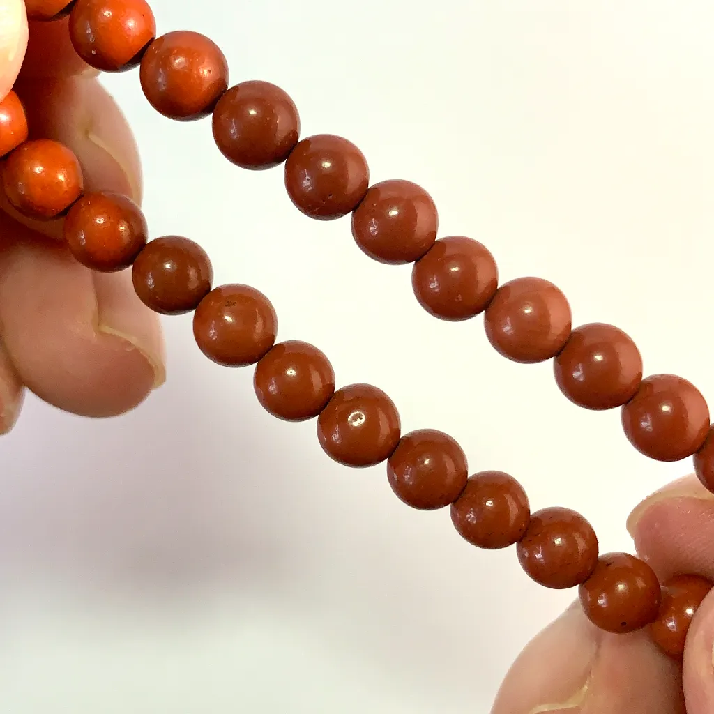 Close-up of Red Jasper Bracelet 8mm beads and elastic cord