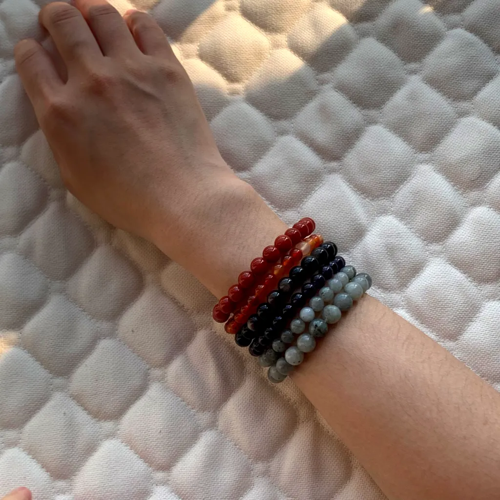 Silver Obsidian Bracelet layered with South Red Agate Bracelet and Other Bracelet on the wrist - a stacked everyday styling